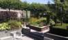 tuinmetplantenbakkenvangebakkenwaalformatenenbestratingvanchineeshardsteen_small.jpg