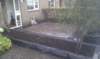 tuinmetverhoogdeborderoudegebakkenwaalformatenincombinatiemetchineeshardsteen_small.jpg